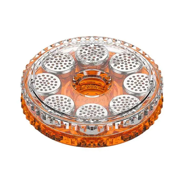 Round orange and clear plastic magazine on a white background