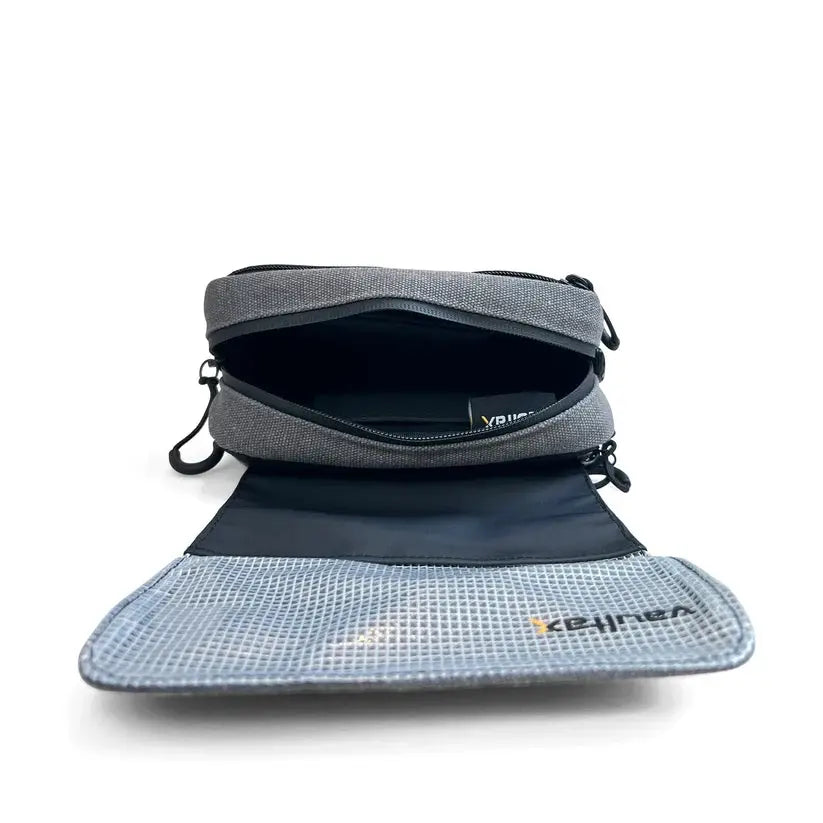 A gray and black Kejina folding pouch shown open, revealing its interior compartments and mesh pocket on a clean white background.