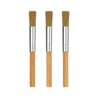 Three Storz and Bickel wooden-handled brushes with bristle heads on a white background