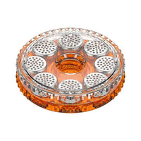 Round orange and clear plastic magazine on a white background